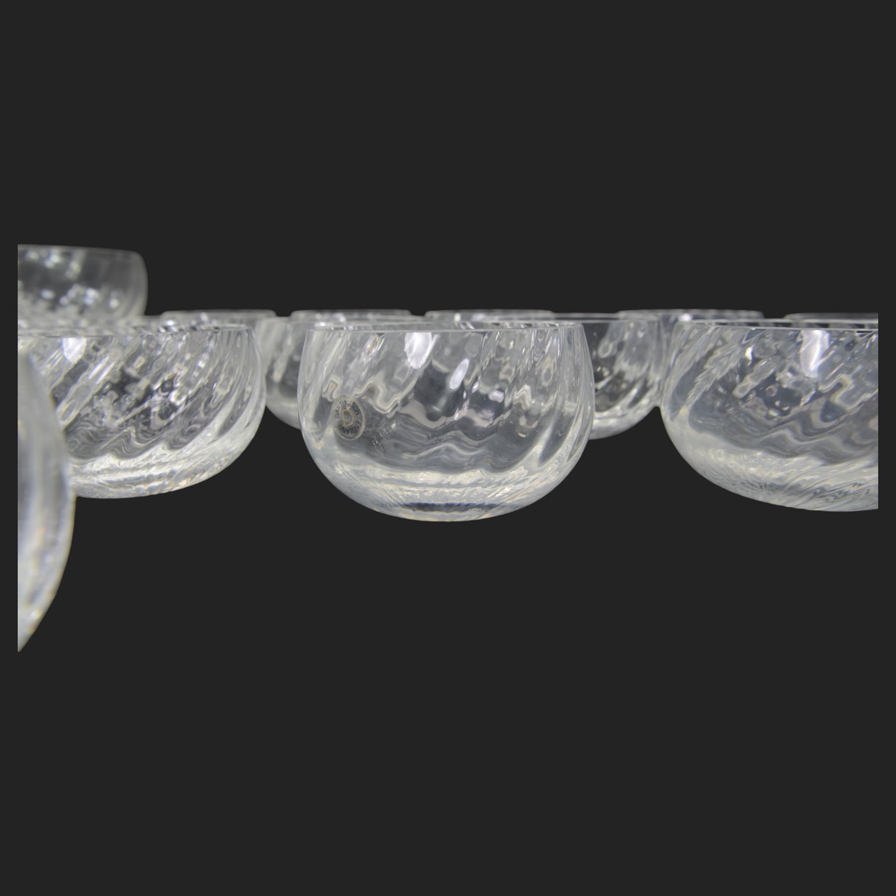 Dartington Ripple pattern fruit set comprising thirty bowls and serving bowl and a number of plain glass champagne saucers