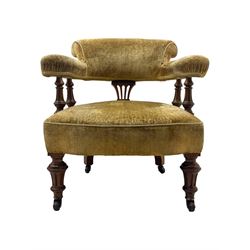 Victorian pair of mahogany armchairs, upholstered in gold velvet fabric, each with curved back, pierced splat and scroll arms, one with rounded seat and the other square, on turned front supports with castors