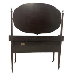 Edwardian inlaid mahogany kneehole dressing table, raised shaped oval bevelled mirror back, fitted with five drawers with banding and stringing, on square tapering supports with castors