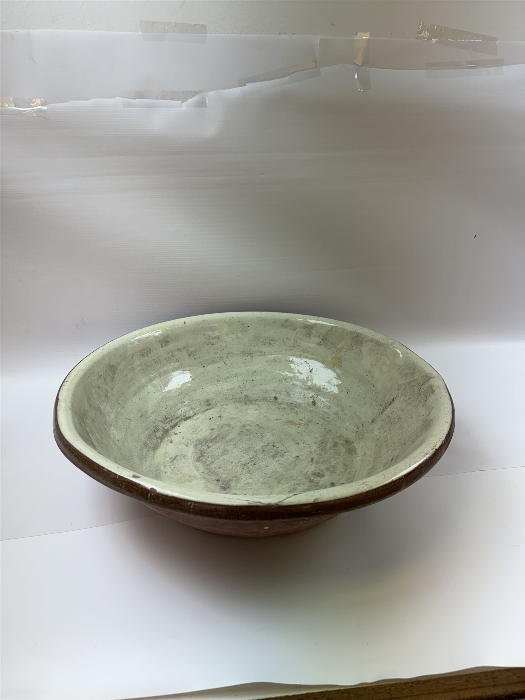 Late19th/ early 20th Century glazed earthenware dairy bowl, H14cm D50cm