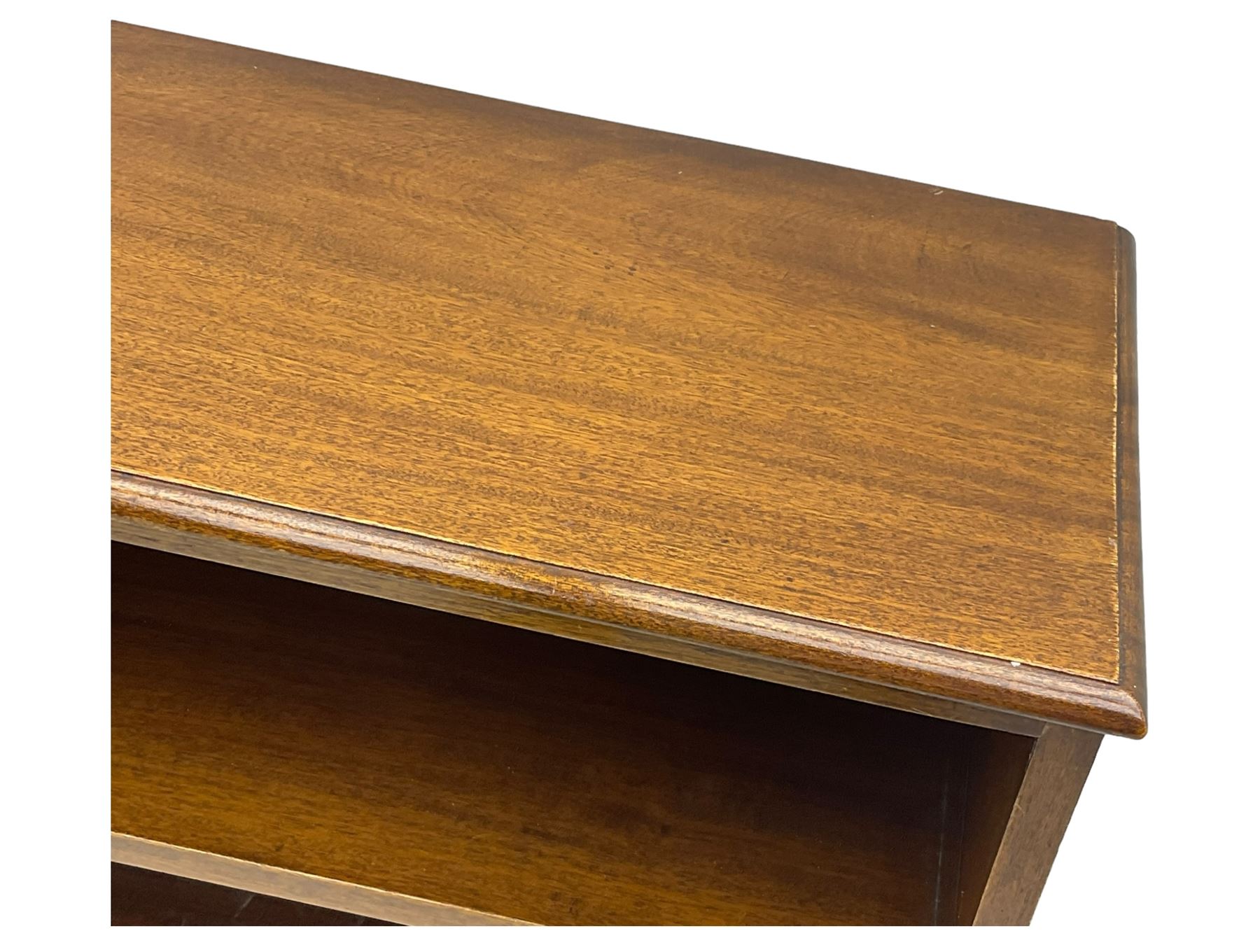 20th century mahogany open bookcase, fitted with two shelves, on bracket feet