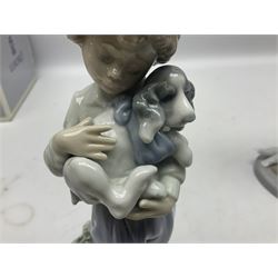 Two Lladro figures, comprising Little Friends, no 6129, with original box, together with My Buddy, no 8609, largest example H23cm