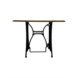 Late 19th century Singer sewing table, rectangular mahogany top mounted on a black cast iron base with decorative scrollwork and 'Singer' logo, on curved supports 