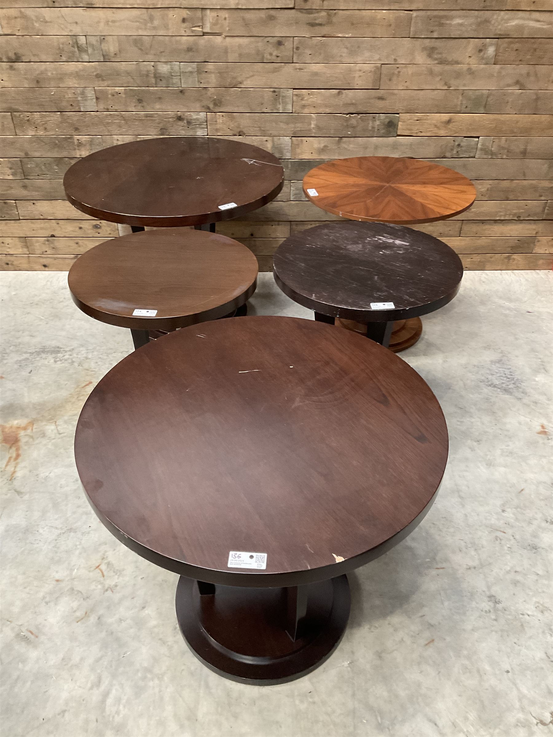 Circular walnut occasional table and four other circular tables