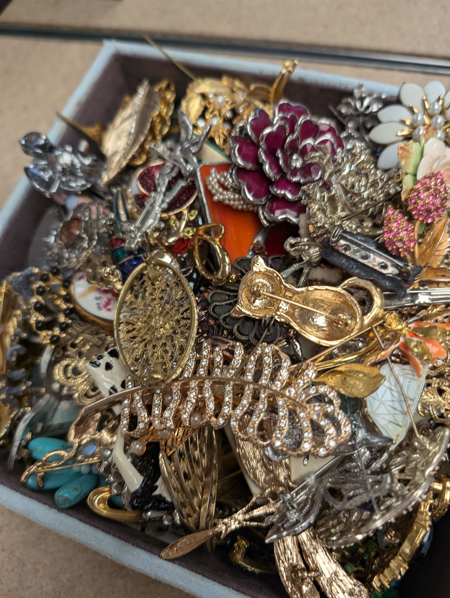 Large collection of costume brooches, including vintage, animal and novelty examples