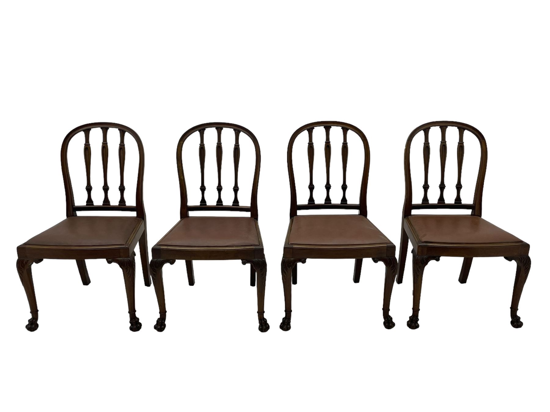 Set of six early 20th century Hepplewhite design mahogany dining chairs, moulded arched frame back, three shaped vertical rails carved with stylised foliate decoration, drop-in seats upholstered in brown fabric within moulded seat rails, on acanthus leaf carved cabriole supports with paw carved terminals 