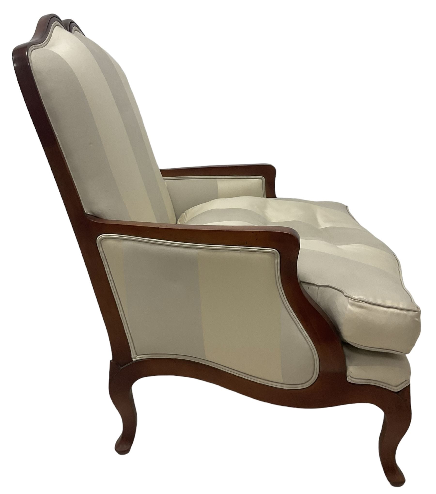 Duresta - French design hardwood-framed wide-seat armchair, shaped cresting rail over curved arms, upholstered in two-tone off-white striped fabric with loose seat cushion, shaped apron and cabriole feet 