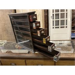 Early 20th stained pine and glazed wall mounting cigarette shop display cabinet, fitted with six sliding drawers with divisions and scalloped handles  - THIS LOT IS TO BE COLLECTED BY APPOINTMENT FROM THE OLD BUFFER DEPOT, MELBOURNE PLACE, SOWERBY, THIRSK, YO7 1QY