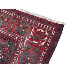 Persian Meymeh red ground rug, stepped lozenge medallion and spandrels, decorated all over with tree of life motifs, the main border decorated with repeating stylised plant motifs within geometric guard stripes 