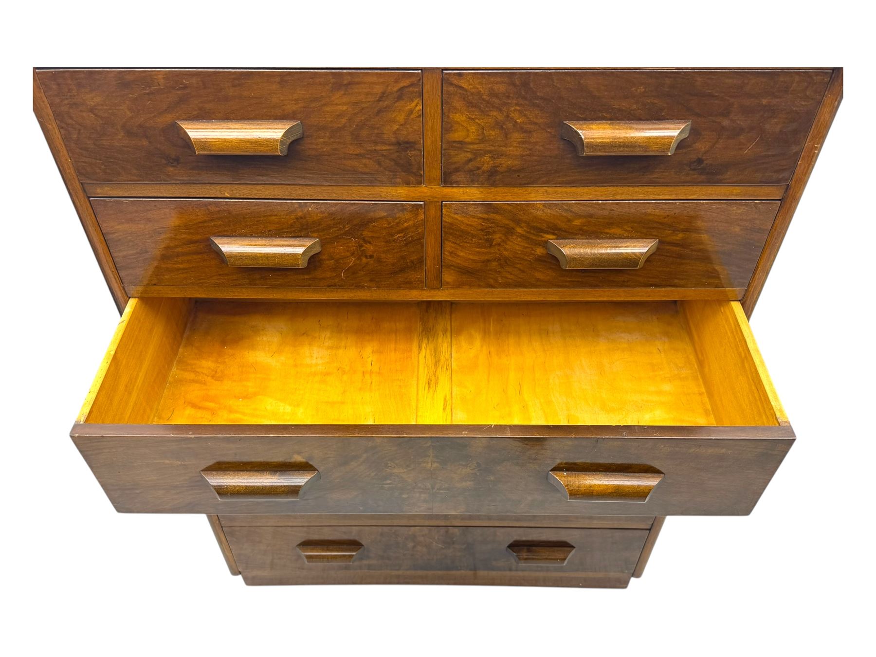 Early 20th century walnut chest, fitted with four short and four long drawers, on recessed plinth base