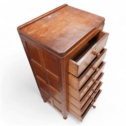 Mouseman - adzed oak pedestal chest, fitted with six drawers each with turned handle, panelled sides, on octagonal feet, by the workshop of Robert Thompson, Kilburn

Provenance - this lot comes to us for sale from direct descent of Robert Thompson. Thompson is the great grandfather of the vendor.