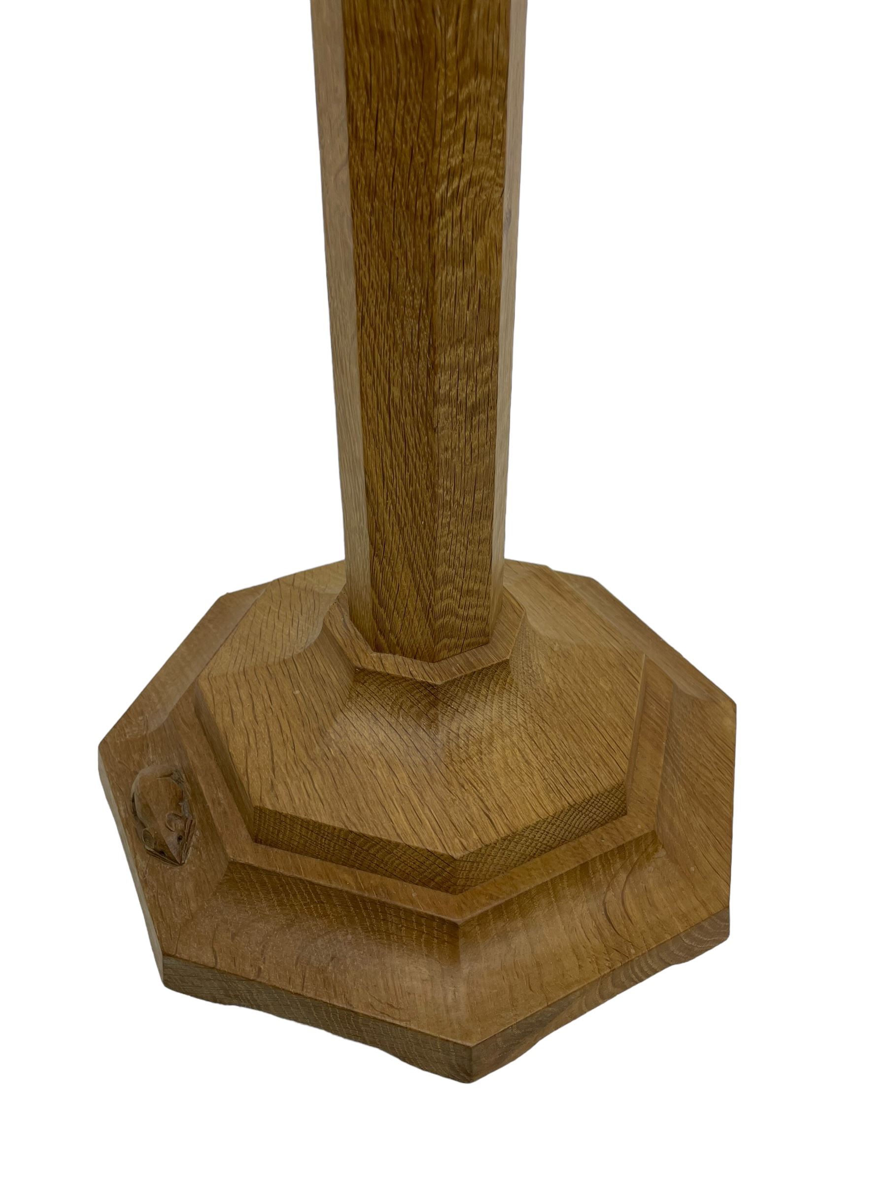 Mouseman - oak standard lamp, octagonal tapered stem on stepped and moulded octagonal base, carved with mouse signature, by the workshop of Robert Thompson, Kilburm 