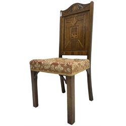 19th century walnut side chair, foliage carved cresting rail over geometric inlaid back with central panel depicting buildings, upholstered seat, on moulded and chamfered square supports
