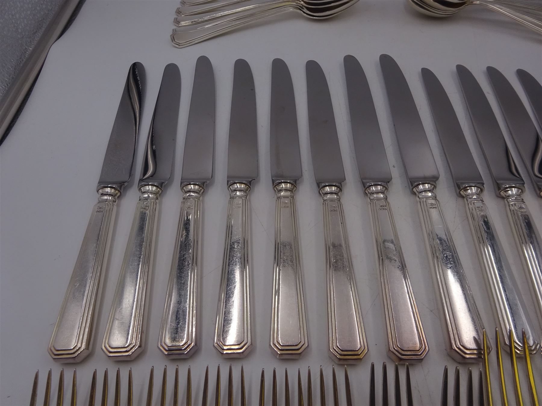 Mappin & Webb Athenian pattern silver cutlery for eight place settings, comprising table forks, silver handled table knives, dessert spoons, dessert forks, silver handled butter knives, soup spoons and teaspoons, hallmarked Mappin & Webb Ltd, Sheffield 1978, contained within anti-tarnish fabric wraps and boxed 