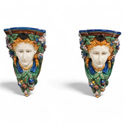 Pair of matching early 20th century Majolica wall brackets or corbels, formed as two ladie...