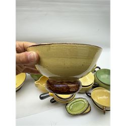 French green and yellow glazed tea and dinner wares by Etienne Noel, including milk jugs, teacups, side plates, bowls etc (43)