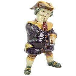 19th century French majolica jar in the form of a snuff taking Toby with removeable head H30cm