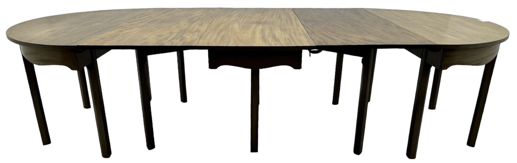 Early 19th century mahogany extending dining table - two D-ends, single drop-leaf centre and additional leaf, on square moulded supports