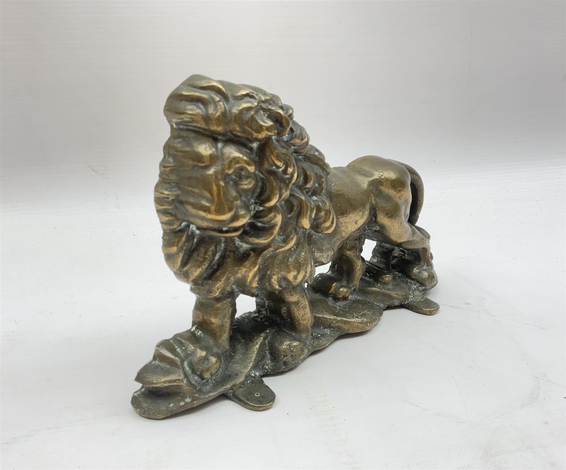 Brass door stop, modelled as a lion, H15cm