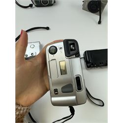 Eight Canon compact Ixus cameras, to include two Ixus examples serial nos. 2309147 & 2273184, Ixus M-1 serial no. 2932566, Ixus L-1 serial no. 2161988, Ixus Z90 serial no. 2201833,  Ixus X-1 serial no. 4704380, Z60IX serial no. 7474817, Ixus V2 serial no. 4431003237 and a Canon Powershot 350 digital camera serial no. H7MX00941