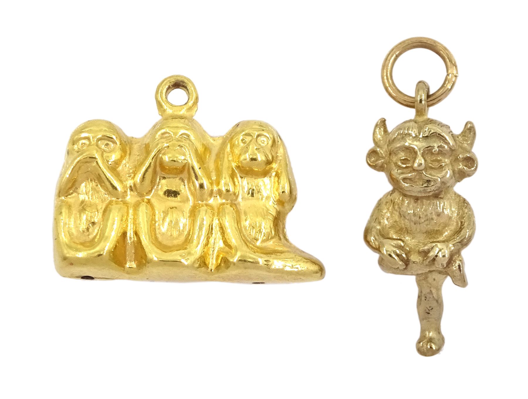 Two 9ct gold pendant / charms including the three wise monkeys and Lincoln Imp, both hallmarked