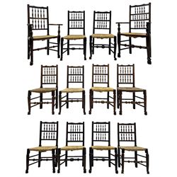 Matched set of twelve 19th century elm Lancashire spindleback dining chairs, shaped cresting rail over spindle back, rush seat, on turned supports united by turned stretchers, ring and globular turned front stretcher 