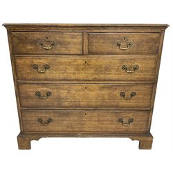 Early 20th century Georgian design oak chest, fitted with two short over three long drawers, lower moulded edge over bracket feet