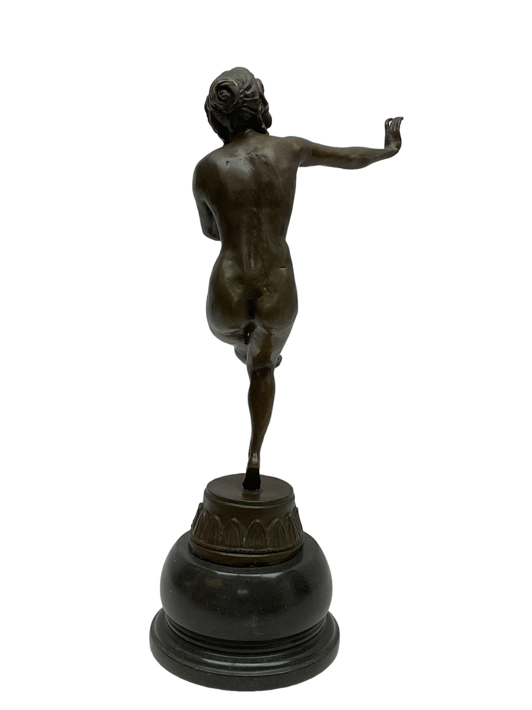 After Claire Jian Robertine Colinet (1880-1950); Art Deco style bronze, modelled as a dancing nude figure upon a marble base, H22cm