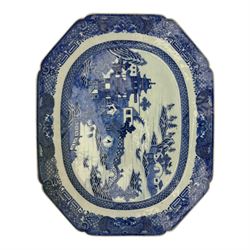 Six 18th century Chinese Export blue and white platters, each of rectangular canted form decorated with various landscape scenes, within foliate borders, max L45cm (6)