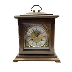 20th oak cased mantle clock, German spring driven movement striking the hours on three gong rods.