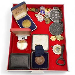 Tokens, medallions and miscellanea, including 'Hedley Swan and Co Ltd Joplings' one penny, 'Blackmores Beverley Road' one shilling, 'Brett's Limited' one shilling, various pin and other badges, buttons, Goldstream Guards bar brooch, small number of coins etc, housed in four Lindner trays