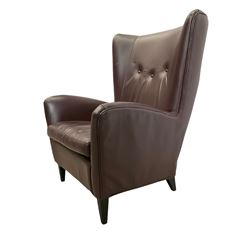 Wing back armchair upholstered in cocoa brown leather