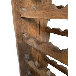 Large reclaimed oak eight tier wine rack, rectangular top over eight racks each with ten bottle divisions, on end supports