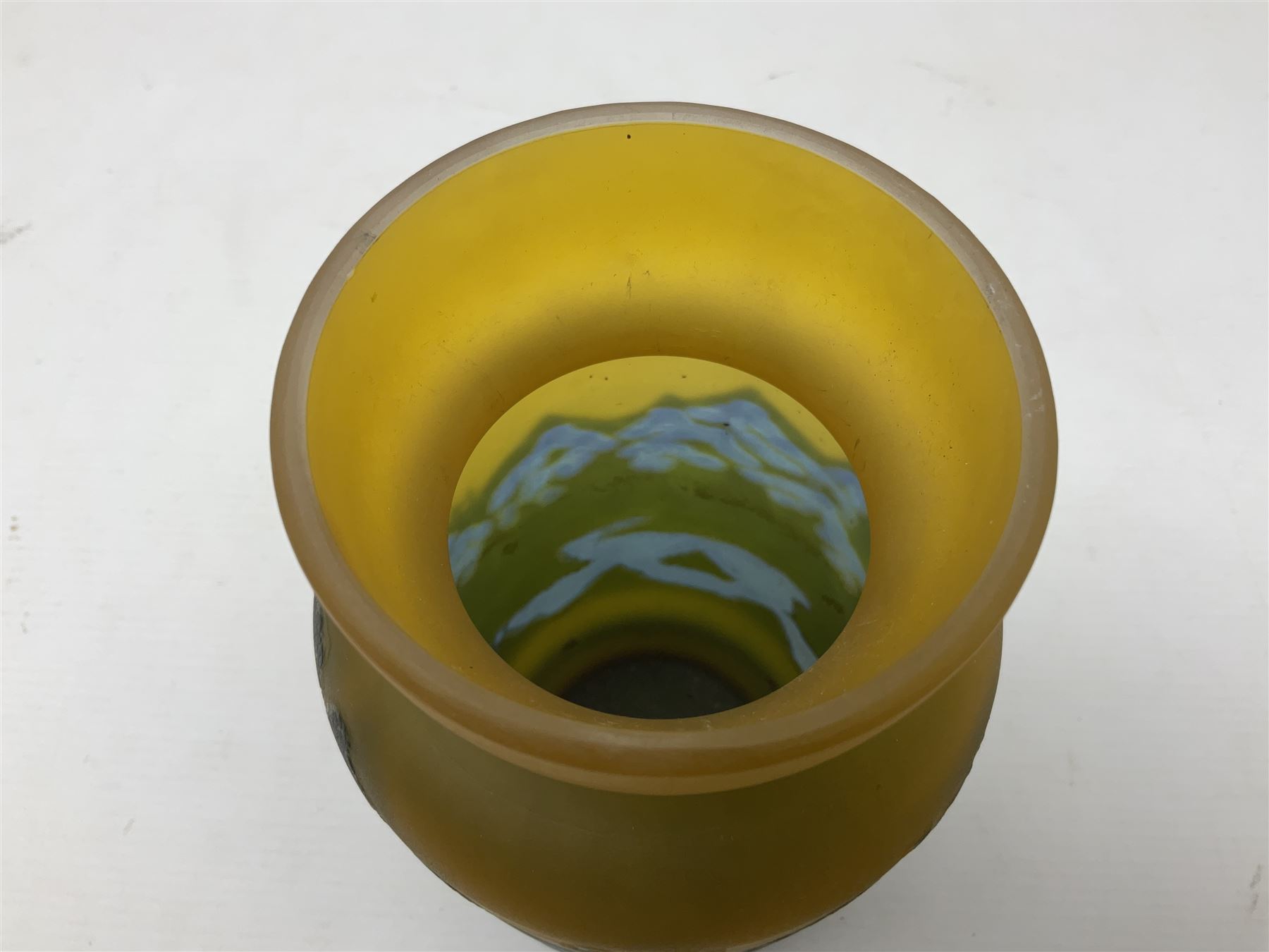 Art Nouveau style glass vase, in the style of Galle,the body decorated with woodland and mountain scene, upon a yellow ground, H20cm 