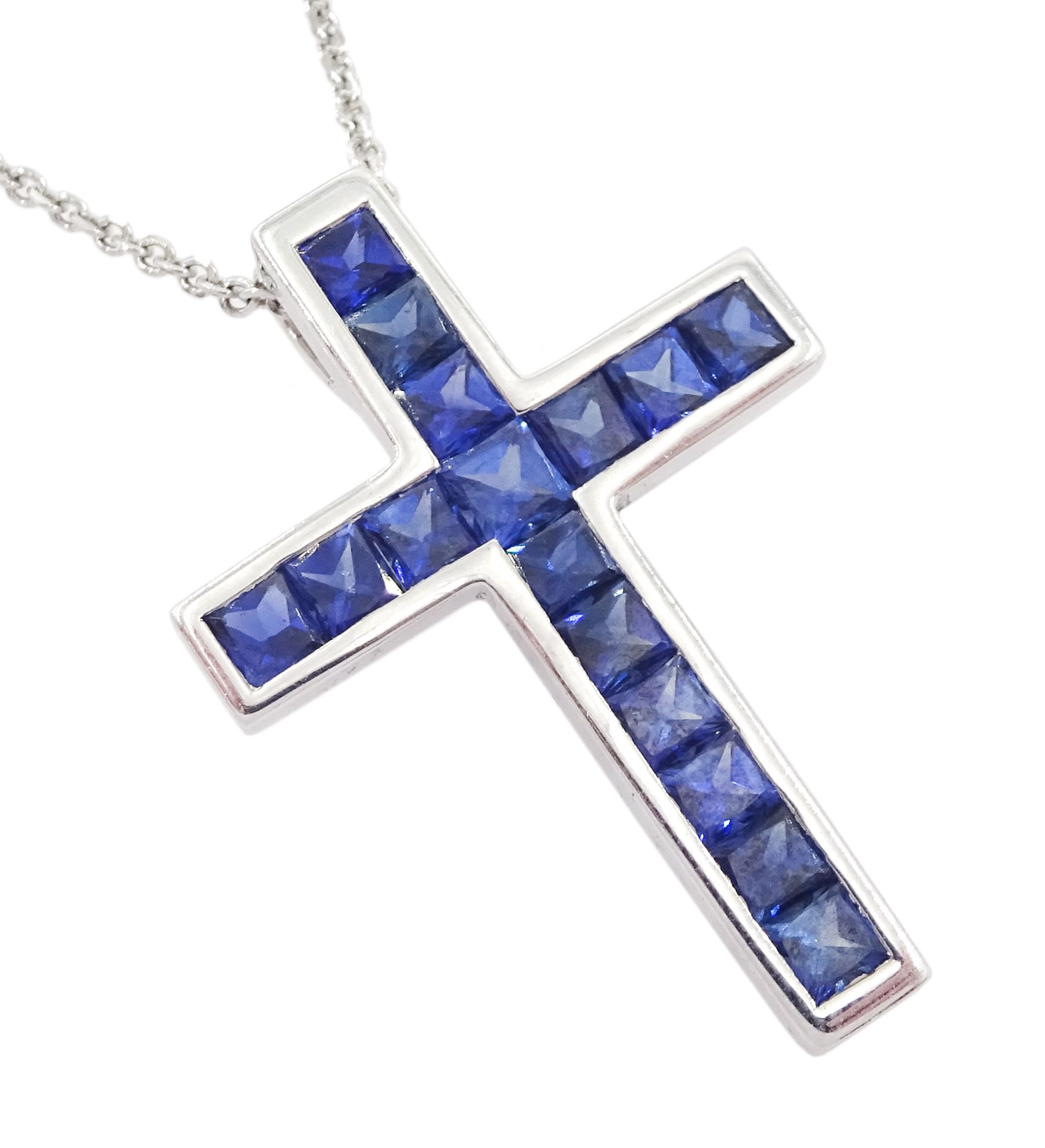 18ct white gold two piece princess cut sapphire and round brilliant cut diamond cross pendant, hallmarked, total sapphire weight approx 1.75 carat, total diamond weight approx 0.50 carat, on silver chain