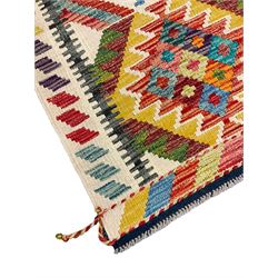 Chobi Kilim rug, pale ground and decorated with multi-coloured geometric pattern 