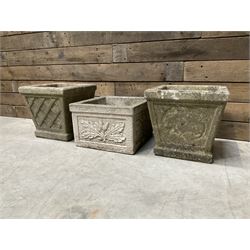 Pair of square cast stone planters, single planter with leaf decoration and a rectangular brick effect planter (4)