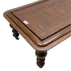 Milling Road - cherry wood coffee table, rectangular top with rounded corners, on turned feet with castors