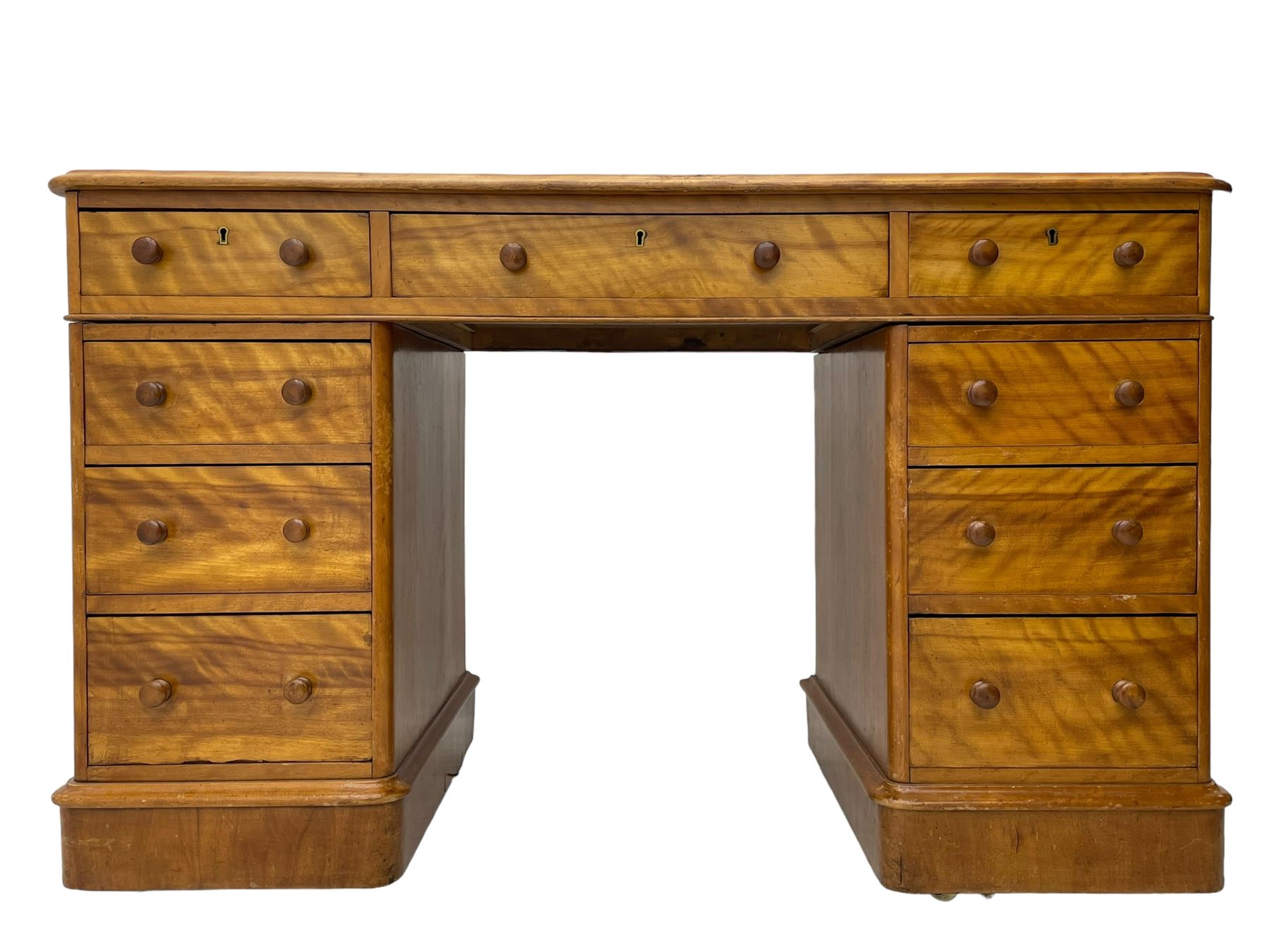 Victorian satin walnut twin pedestal desk, moulded rectangular top with rounded corners and raised back, inset leather writing surface with tooled borders, fitted with nine drawers with turned handles, on moulded plinth base 