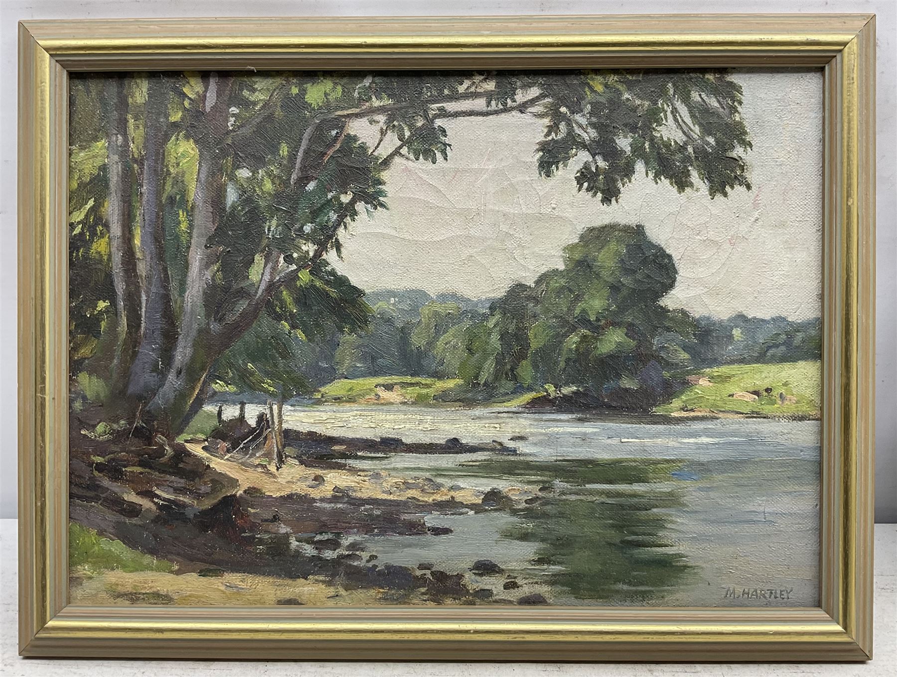 Marie Hartley (Yorkshire 1905-2006): 'The Wharfe near Harewood', oil on canvas signed, titled on printed label verso 25cm x 35cm 