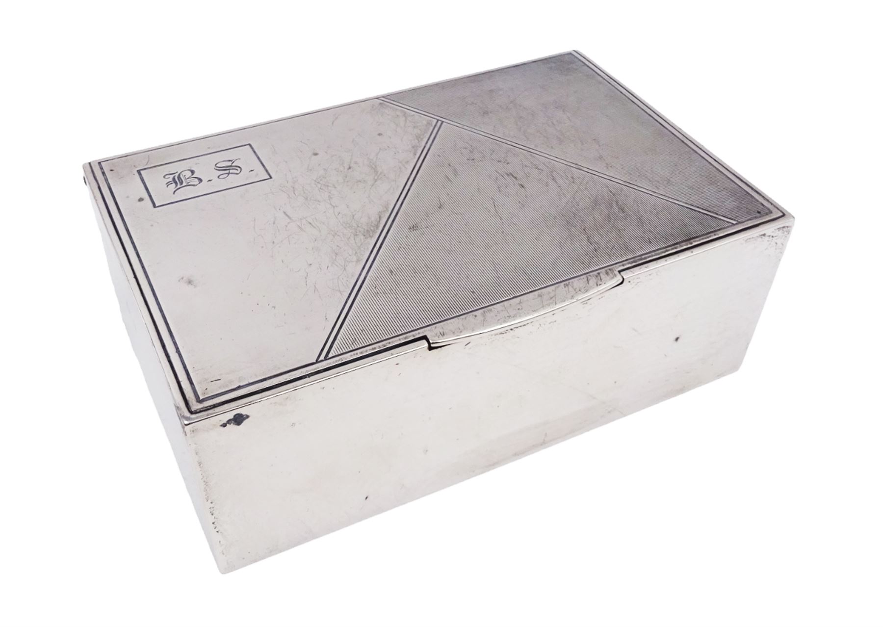 1930s silver mounted cigarette box, of rectangular form, with engine turned decoration and engraved cartouche to hinged lid, opening to reveal a softwood interior, hallmarked London 1930, maker's mark worn and indistinct