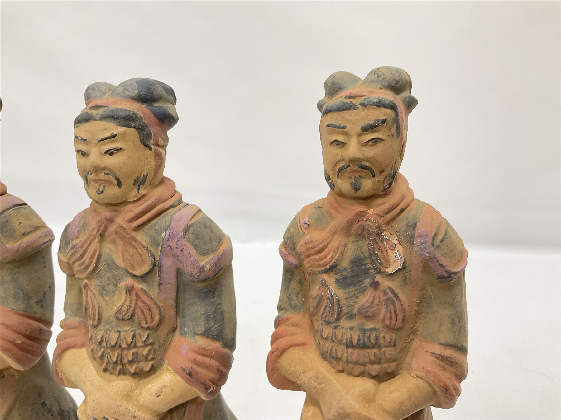 Set of three painted Chinese 'Terracotta Warrior' style figures, H20cm