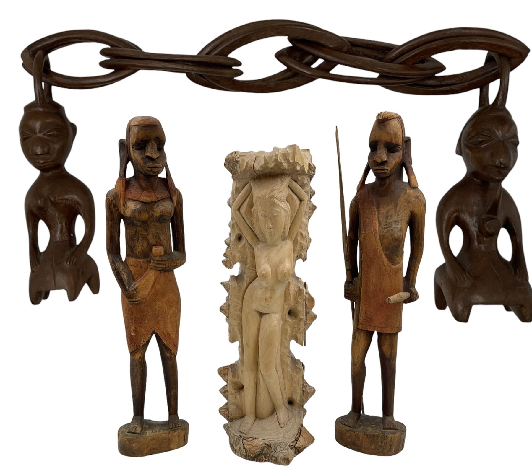 African carved wooden marriage/wedding chain, together with three carved figures, largest H44cm