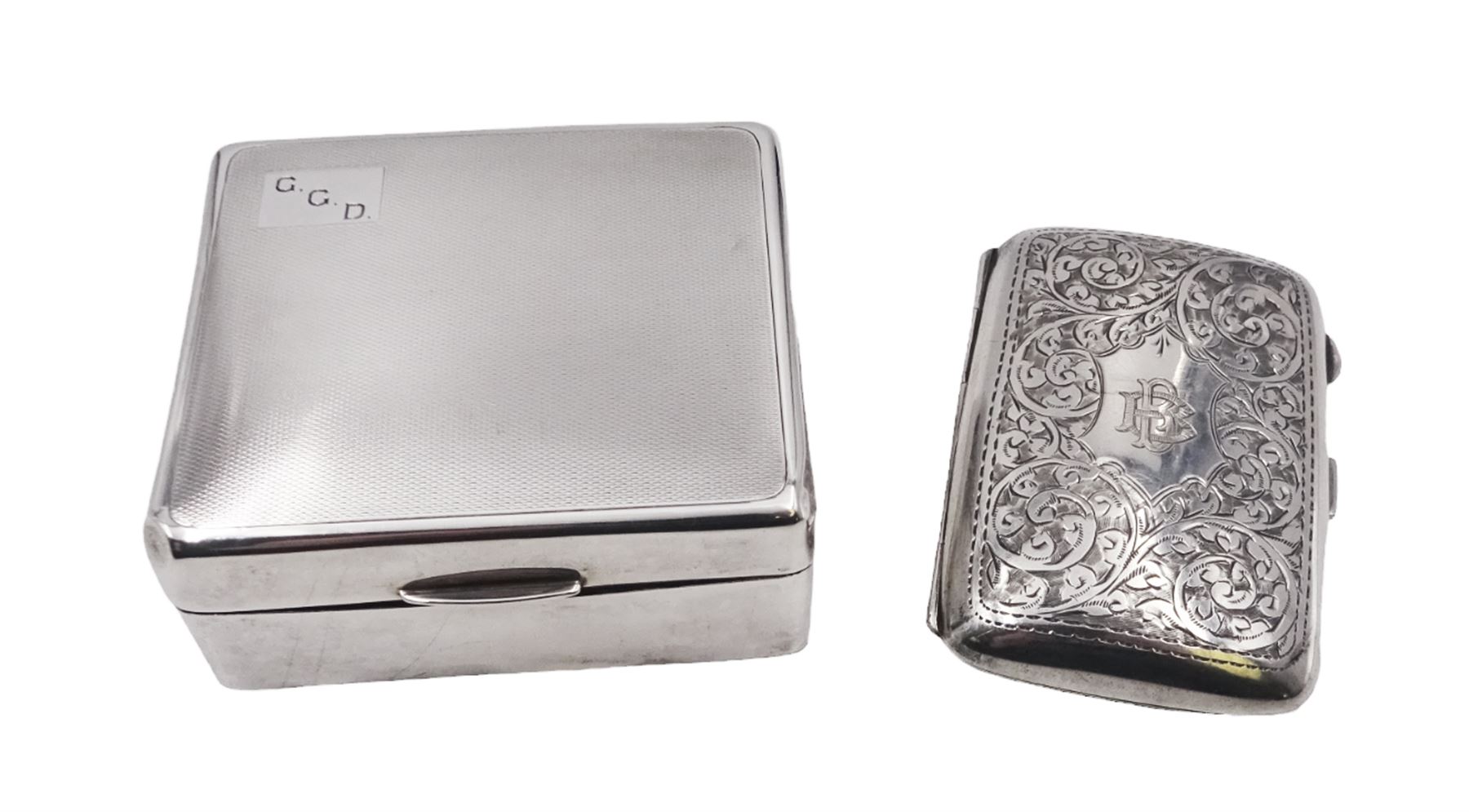 1920s silver cigarette case, of rectangular form with rounded corners, engraved with initials to front cover and scrolling decoration throughout, hallmarked John Rose Birmingham 1922, together with a 1930s silver mounted cigarette box, of plain rectangular form, with engraved initials and engine turned decoration to hinged cover, opening to reveal a softwood lined interior, hallmarked William Neale & Son Ltd, Birmingham 1939, box H3.5cm