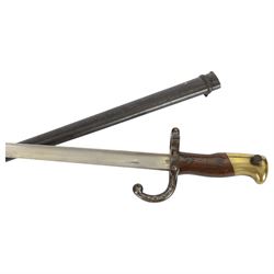 19th century French bayonet, with brass and wood mount, the steel blade engraved 'Mme. d'Armes de Chat. Mai 1878'