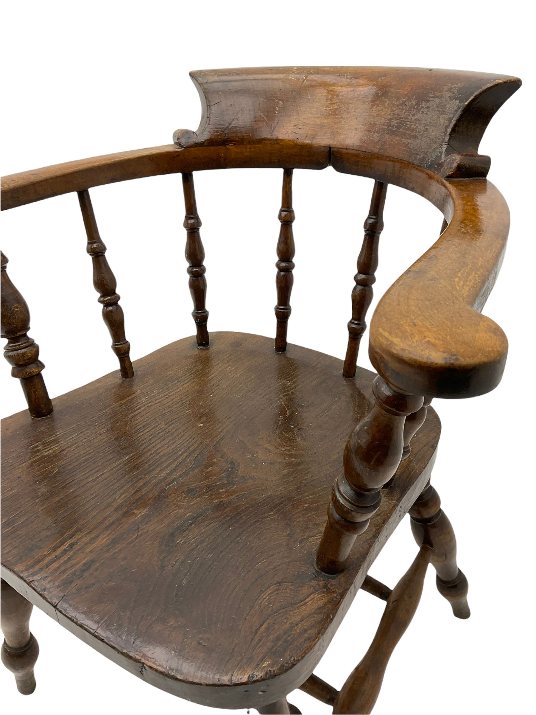 19th century beech and elm smoker's bow armchair, spindle back, turned supports joined by double H stretcher 