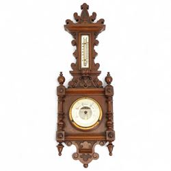 Early 20th century Edwardian aneroid barometer, in a mahogany case with scroll carving, tu...