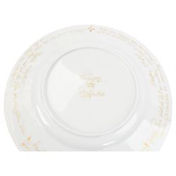 Rosenthal Die Zauberflote pattern dinner plate, designed by Von Bjorn Wiinblad, of circular form the gilt rim decorated in relief with stylised scene's from the Mozart opera,with opera reference inscriptions in German in gilt verso, with printed mark beneath, D32cm