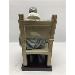Lladro figure, Miguel De Cervantes, modelled a seated man in period dress with a quill in hand, with original box, no 5132, sculpted by  Salvador Furio, year issued 1982, year retired 1988, H36cm 