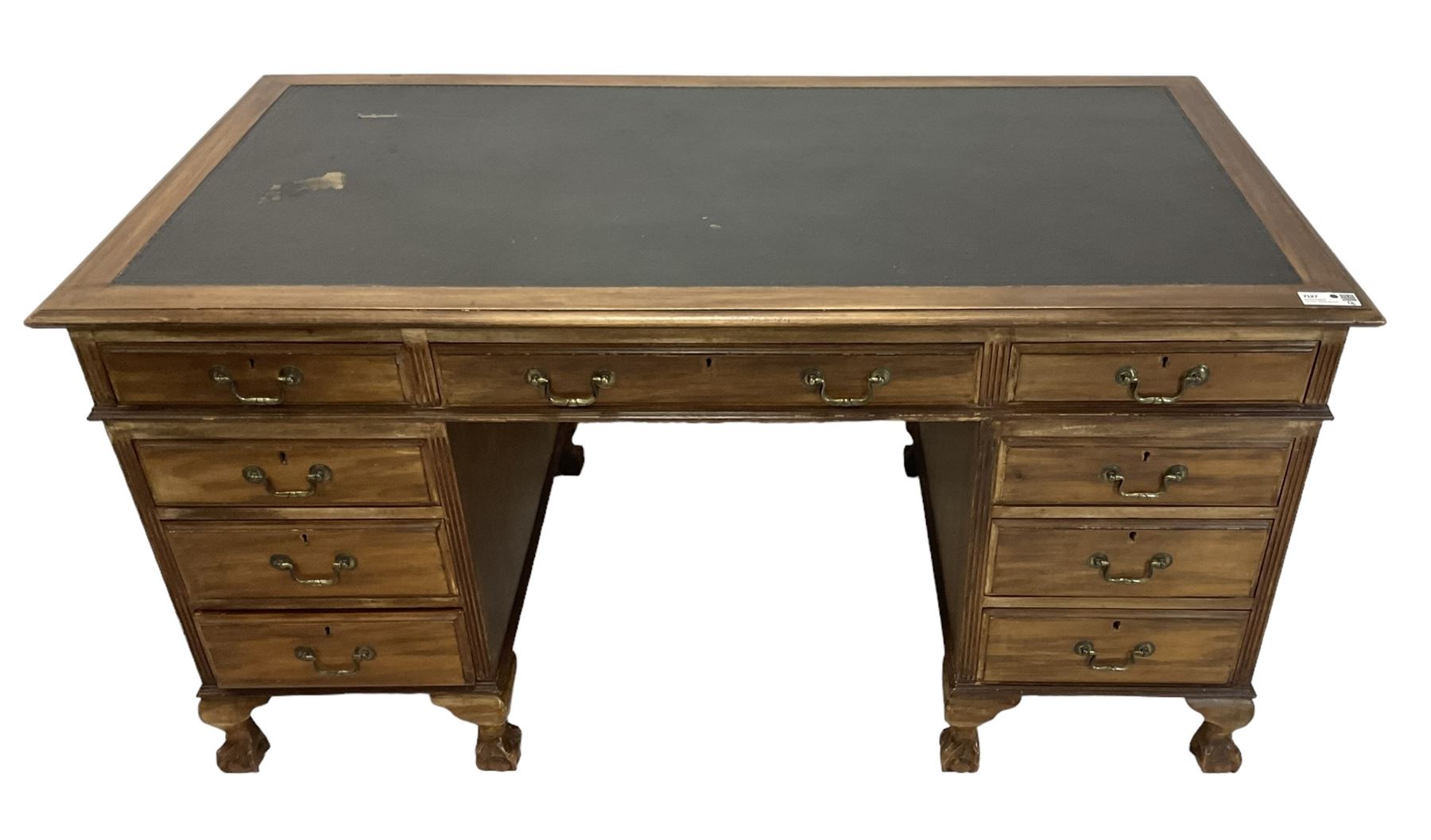 Georgian design twin pedestal desk, rectangular top with green leather inset, fitted with nine drawers, on cabriole supports with ball and claw feet 